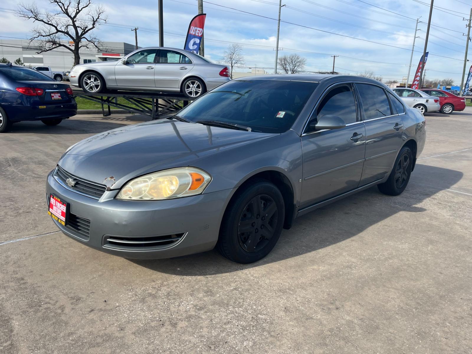 2007 GRAY /black Chevrolet Impala LS (2G1WB55KX79) with an 3.5L V6 OHV 16V FFV engine, 4-Speed Automatic Overdrive transmission, located at 14700 Tomball Parkway 249, Houston, TX, 77086, (281) 444-2200, 29.928619, -95.504074 - Photo #2